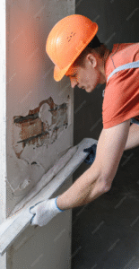 Guide De Lhabitat Guide De L Habitat Artisan Travaillant Mur Fissures