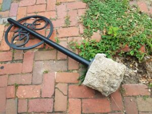 Broken Bike Rack Sign And Red Bricks Or Masonry
